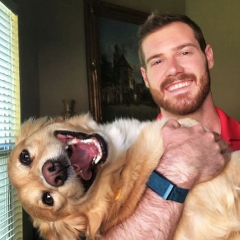 dr. hunter finn holding dog