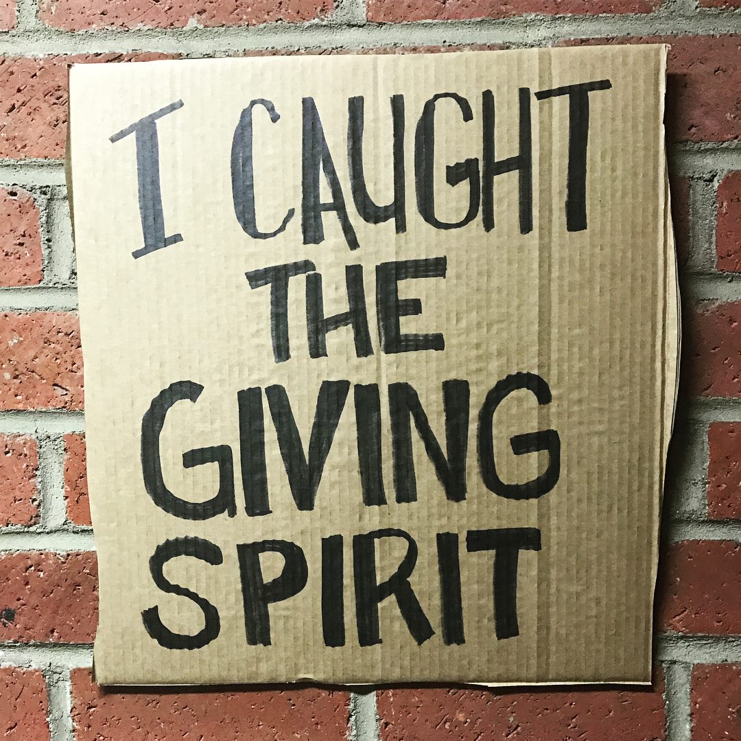 I caught the giving spirit cardboard sign