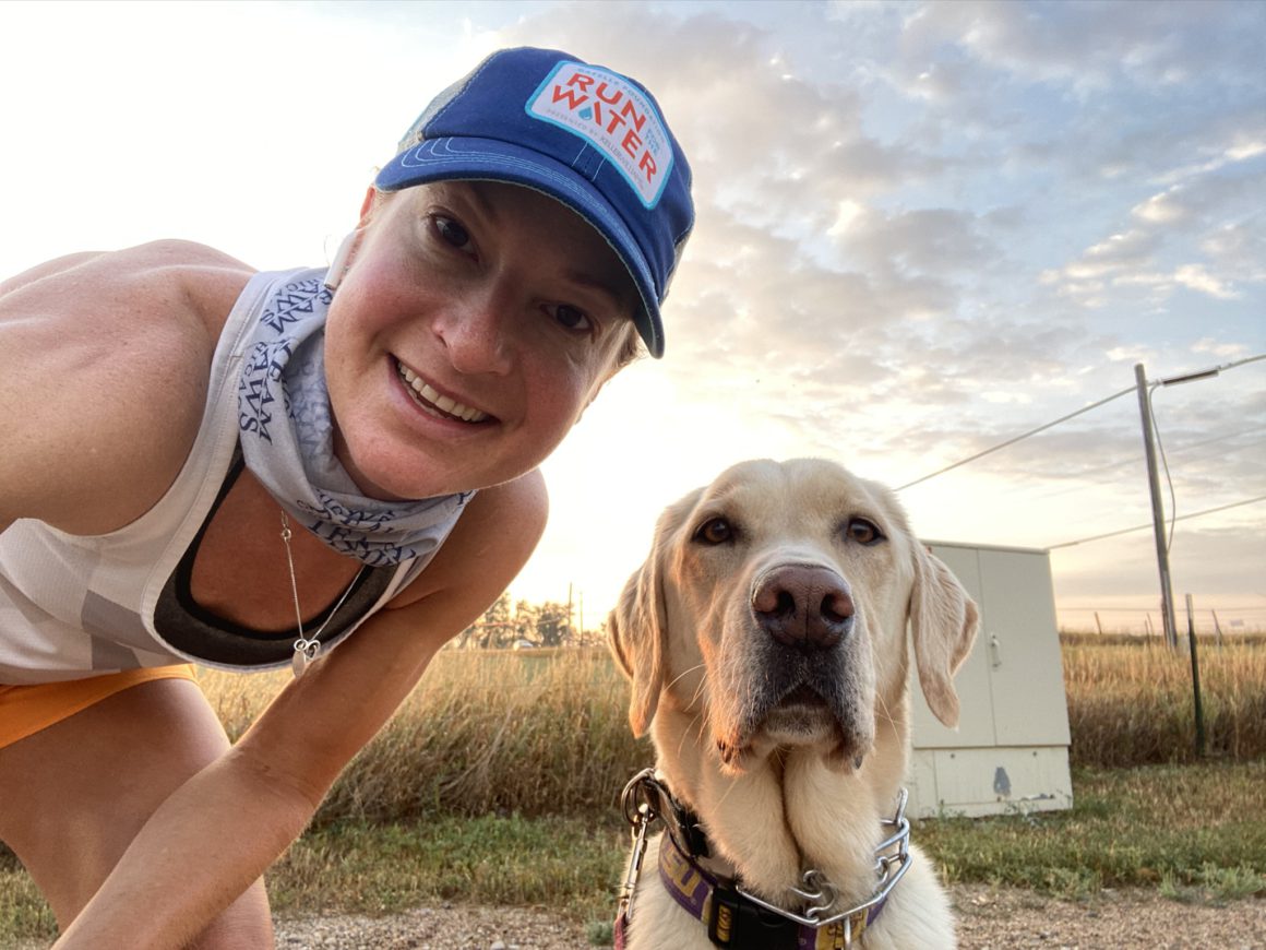 Dr. RuthAnn Lobos with her labrador dog
