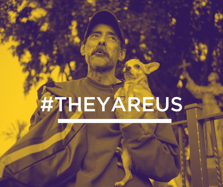 Text #TheyAreUs and man with chihuahua