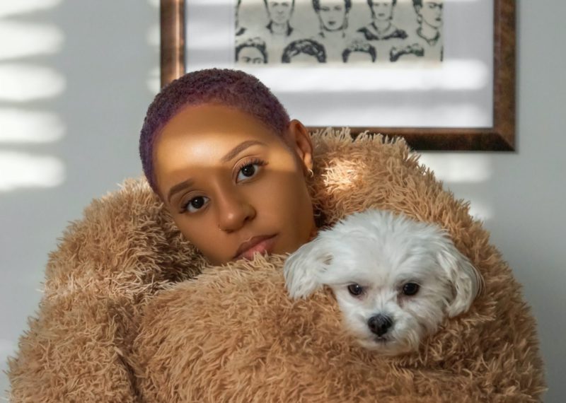 black woman with dog